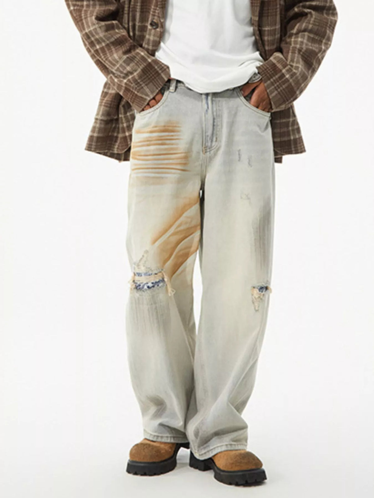 Men's distressed wide leg jeans by Plush Fashion Hub, showing the ripped details and relaxed fit in a casual denim style.