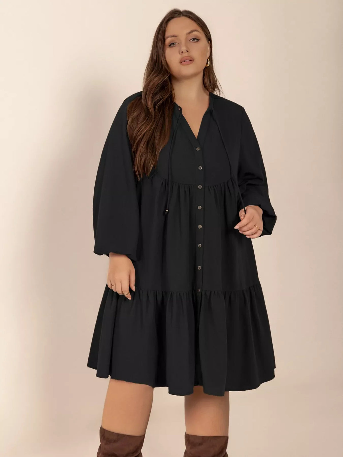Plus size button front balloon sleeve dress by Plush Fashion Hub, featuring a stylish design with puffed sleeves and a flattering fit.