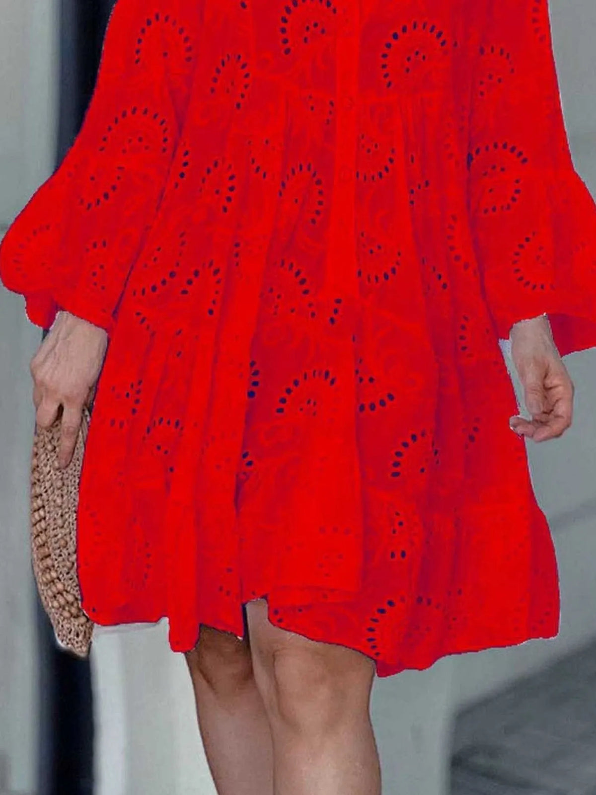 Plus size full length eyelet ruffled hem tiered dress by Trendsi, showcasing a flowing design with eyelet details and tiered layers.