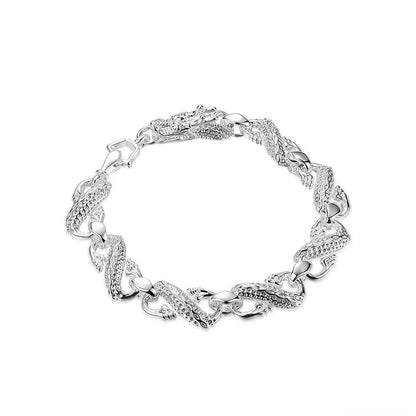 Unisex white dragon braceletExperience the powerful energy and elegance of our Unisex White Dragon Bracelet. Crafted from environmentally-friendly copper and electroplated with 925 silver, the BraceletPlush Fashions ShopPlush Fashion Shop