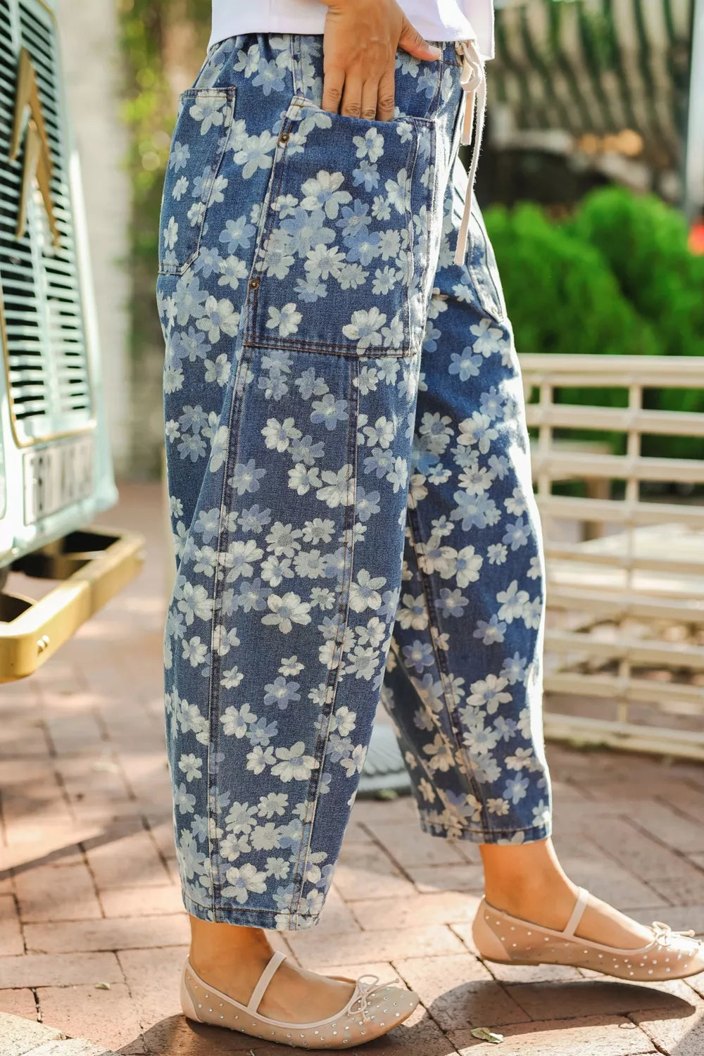 Dainty floral printed drawstring barrel jeans from Plush Fashion Hub, featuring a relaxed fit with floral print and drawstring waist.