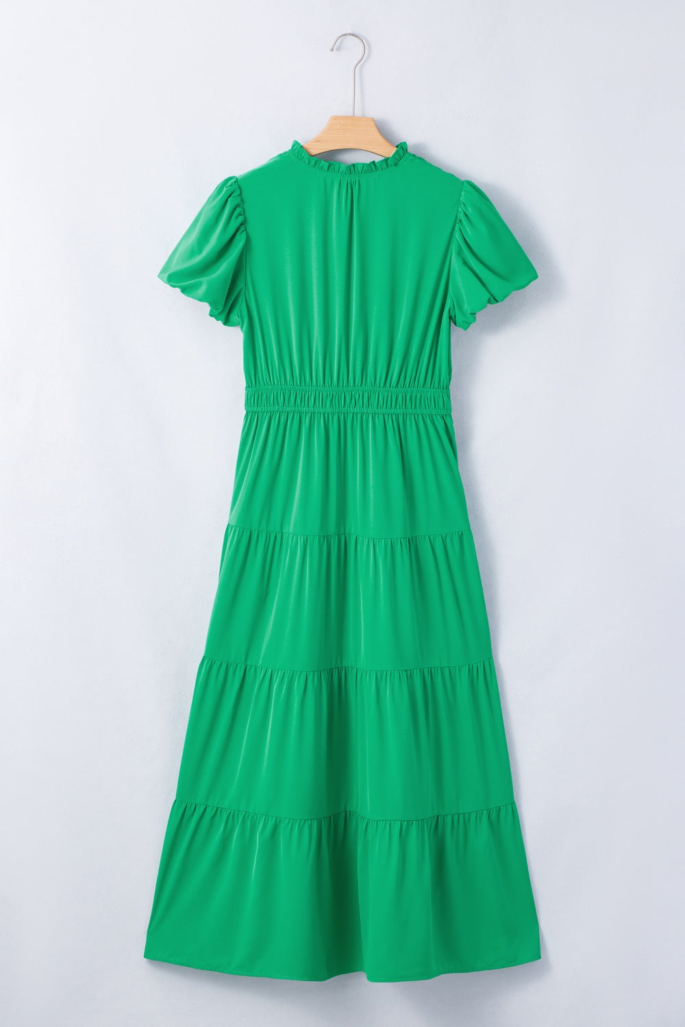 Women's floral ruffled tiered puff sleeve maxi dress by Trendsi, featuring an elegant long dress with floral pattern and layered ruffles.