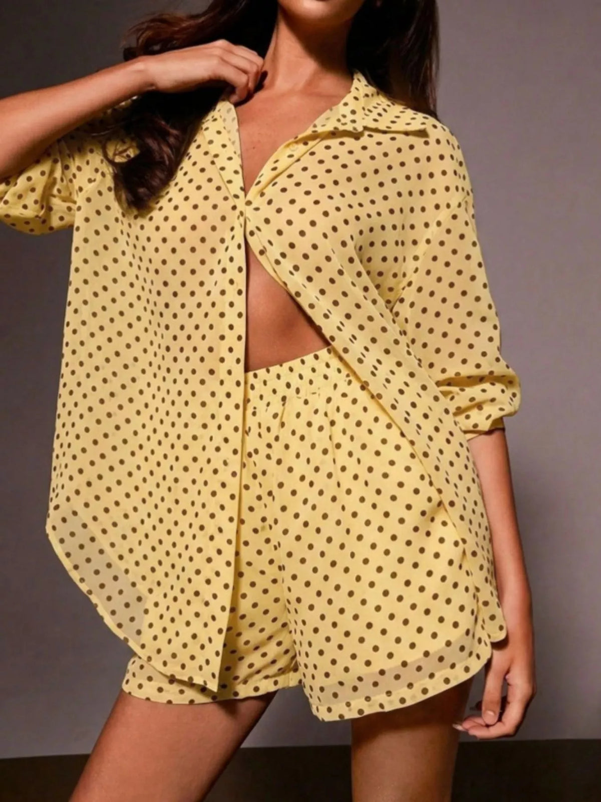 Plush Fashion Hub polka dot button-up shirt and shorts loungewear set displayed on a model, featuring a relaxed fit and playful design.