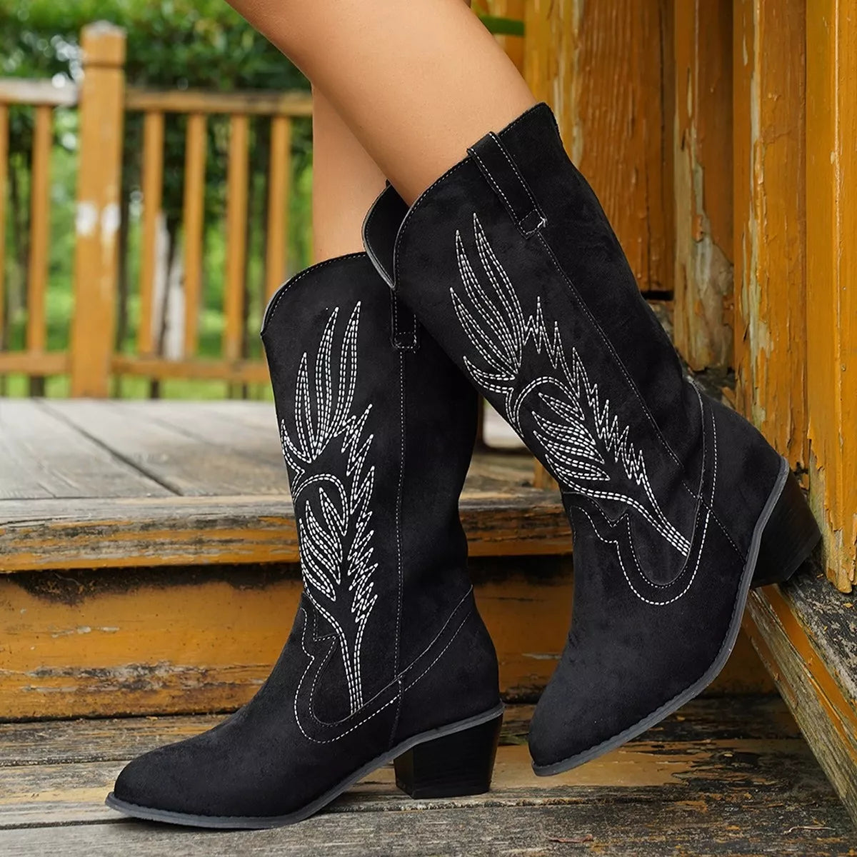 Point toe block heel boots from Trendsi featuring sleek design and sturdy heels, perfect for stylish winter or fall outfits.