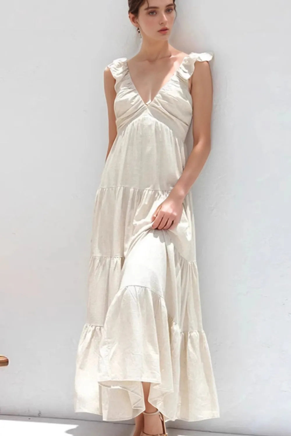 Women’s cotton ruffled v-neck tiered midi dress by Plush Fashion Hub, featuring a flowy design with ruffle details and a v-neck neckline.