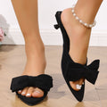 Women's bow-accent kitten heel sandals by Trendsi, elegant and comfortable dress shoes with stylish design and open toe style.