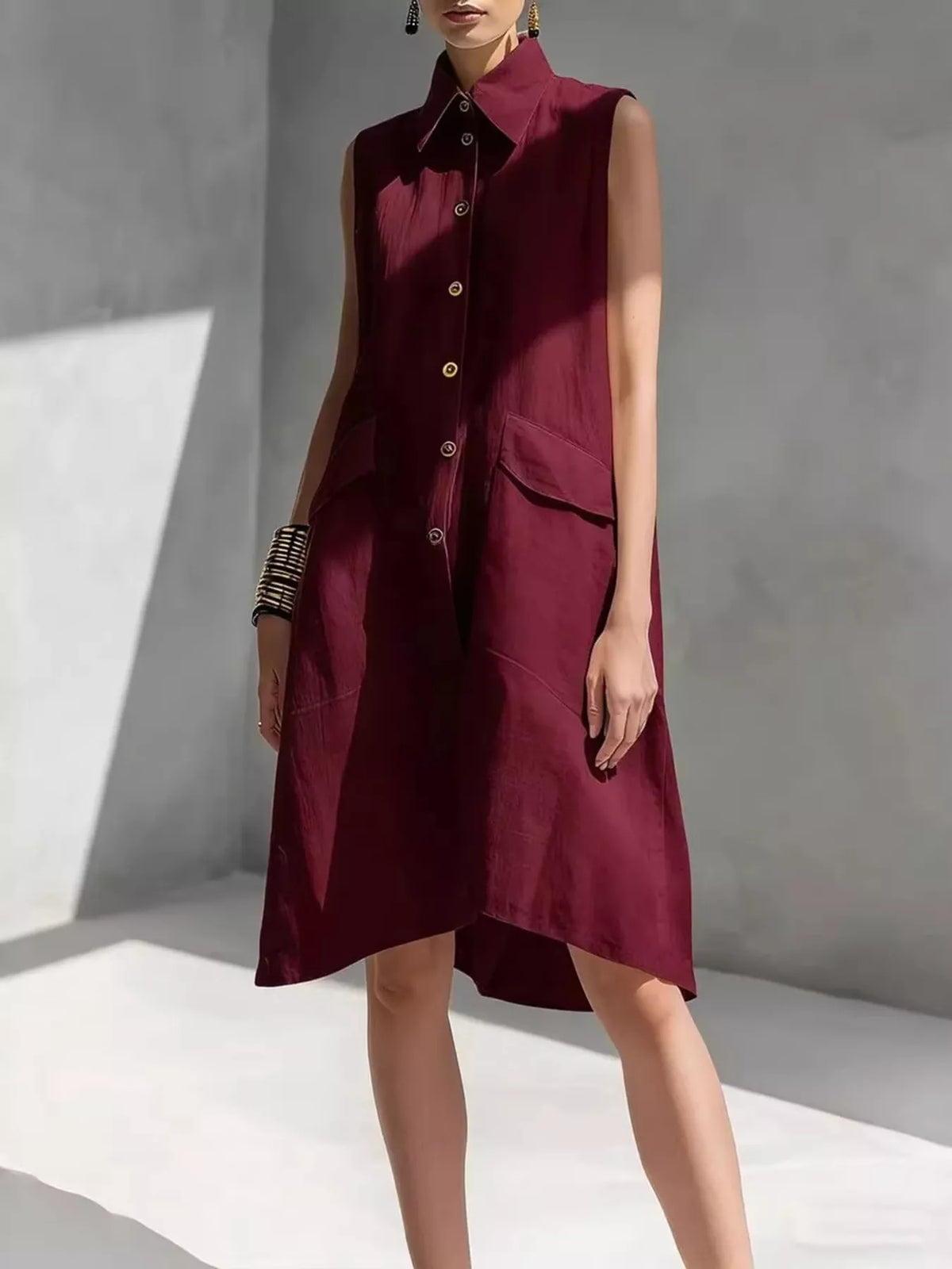 Plus size sleeveless button-front dress by Plush Fashion Hub, featuring a stylish full-size design and casual sleeveless style.
