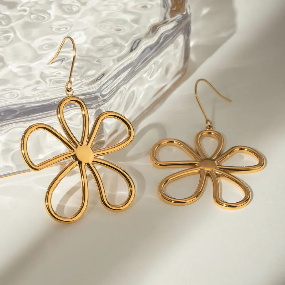 18K gold-plated flower earrings by Plush Fashion Hub, showcasing delicate floral design and shiny gold finish.