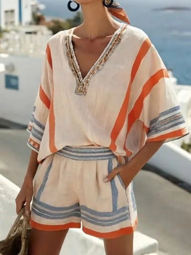 Women's V neck top and shorts set by FitiqueFit, casualwear outfit featuring a comfortable V neckline top and matching shorts.