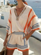 Women's V neck top and shorts set by FitiqueFit, casualwear outfit featuring a comfortable V neckline top and matching shorts.