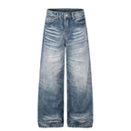 Eprolo gradient washed high-rise denim jeans with faded blue and darker denim accents, front view showing classic five-pocket design.