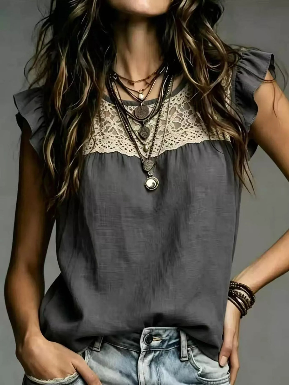 Plus size full lace trim ruffle sleeve short sleeve blouse by Trendsi, featuring lace details and flowy ruffled sleeves.