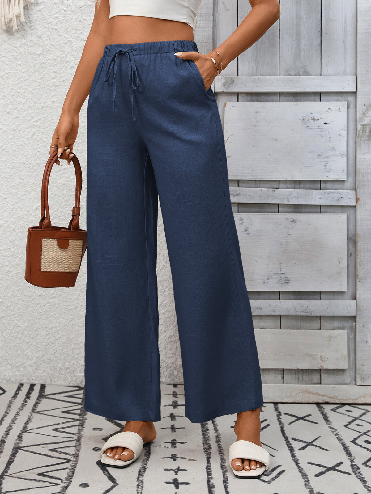 Women's high-waisted wide-leg drawstring pants in soft breathable viscose, stylish and comfortable from Plush Fashion Hub
