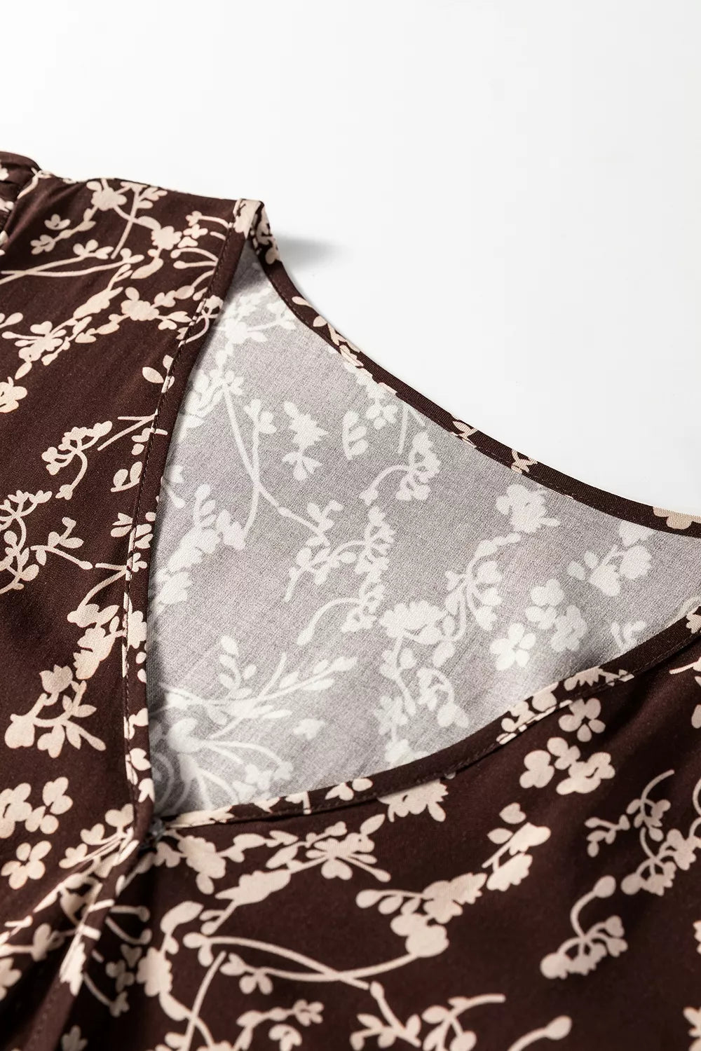 Plush Fashion Hub floral mini dress with ditsy print, split neck, long sleeves, and shirred waist, flared hem, perfect for spring.