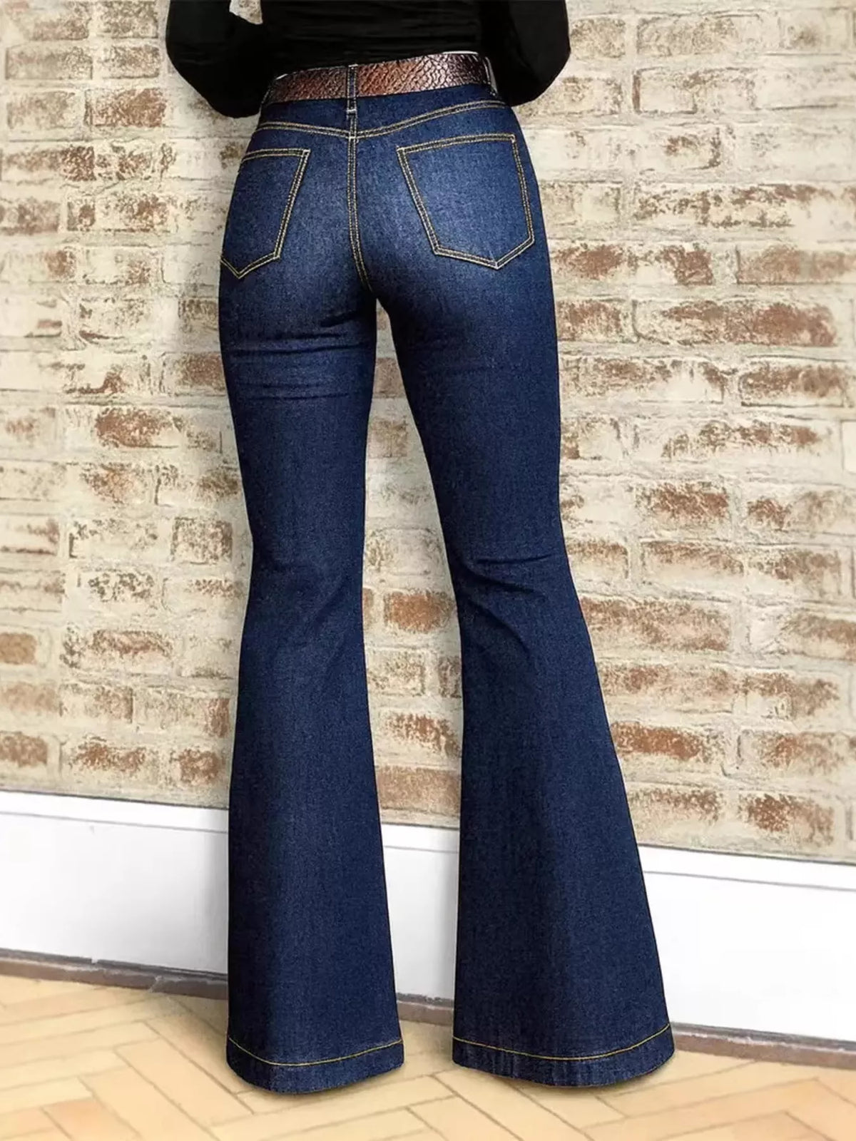 High-waisted flare denim jeans from Plush Fashion Hub, featuring classic blue denim with a fitted waist and wide flare legs.