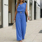 Women's off-shoulder sleeveless wide-leg jumpsuit with high waist and belt, casualwear by FitiqueFit, shown on a model.