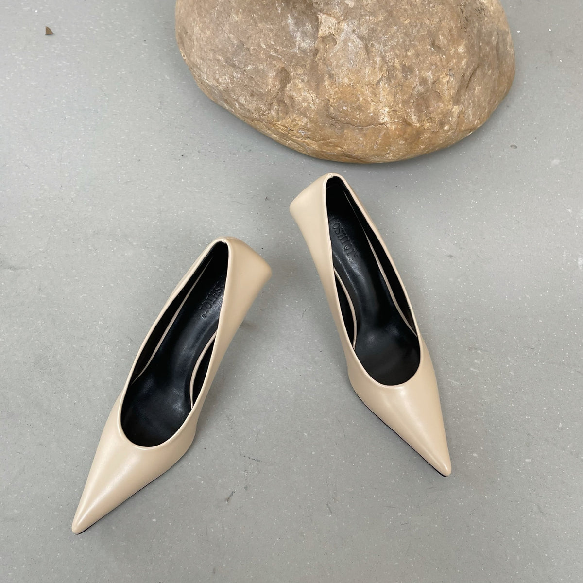 Women's premium leather pointed-toe stiletto pumps by Plush Fashion Hub, showcasing elegant black heels with sleek design.