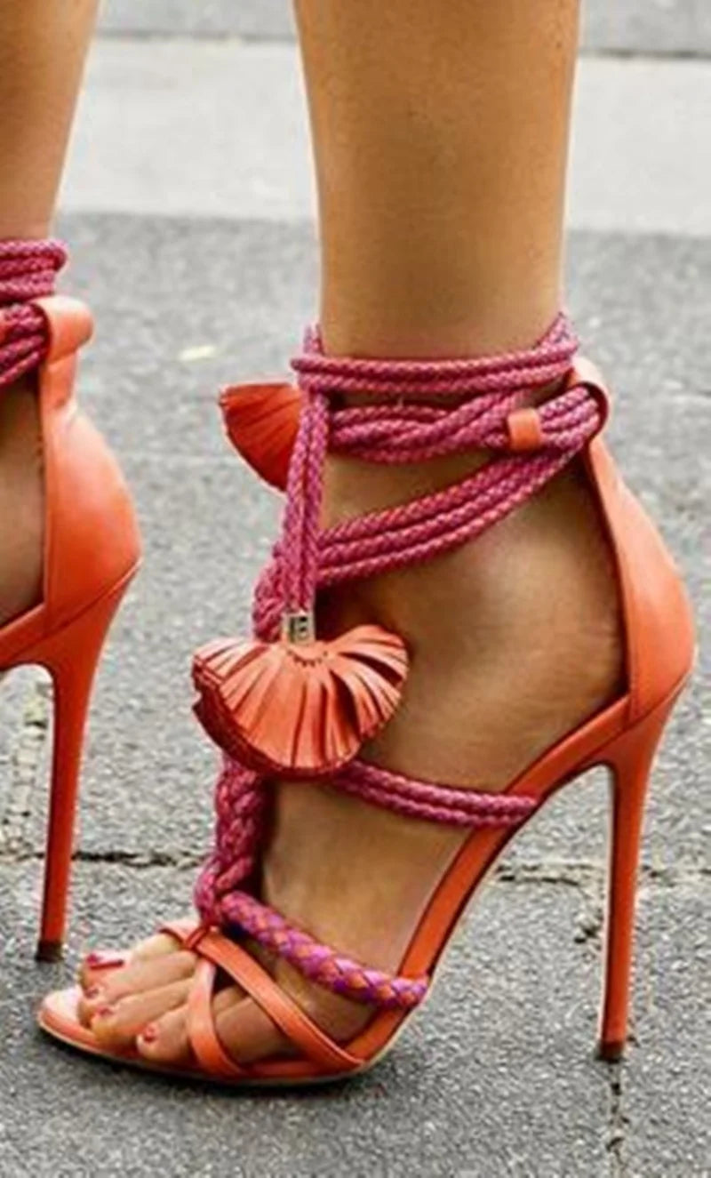 Plush Fashion Hub braided stiletto lace-up sandals with high heels and open toes, featuring woven straps and ankle ties.