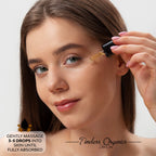 Replenishing Radiance Oil serum by Timeless Organics Skin Care, showing a dropper with golden oil in a glass bottle.