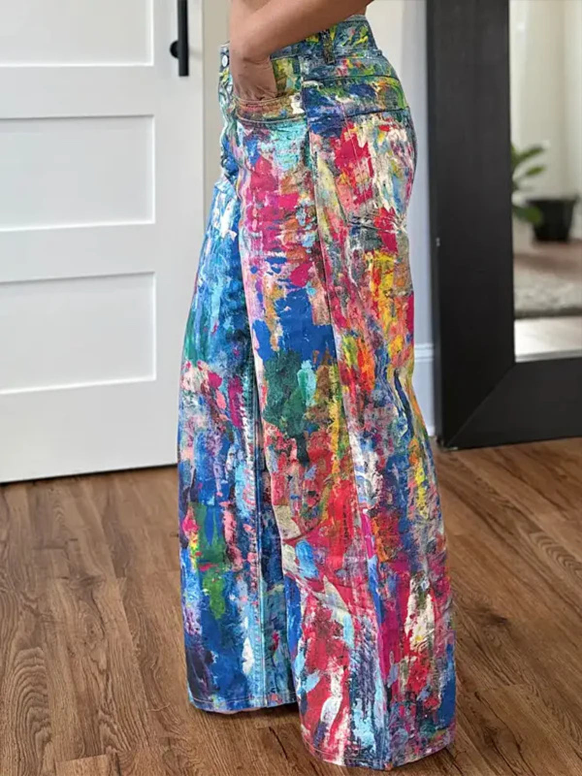 Painted wide leg cotton blend pants with breathable, relaxed fit from Plush Fashion Hub, shown in a stylish casual pose.