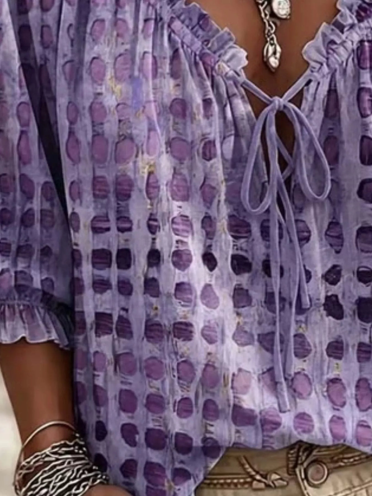Plus size tie neck blouse with 3/4 sleeves by Trendsi, featuring a full-size fit and stylish design.