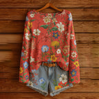 Women's fall wildflower print long sleeve T-shirt by Plush Fashion Hub, featuring a casual, colorful floral design and comfortable fit.