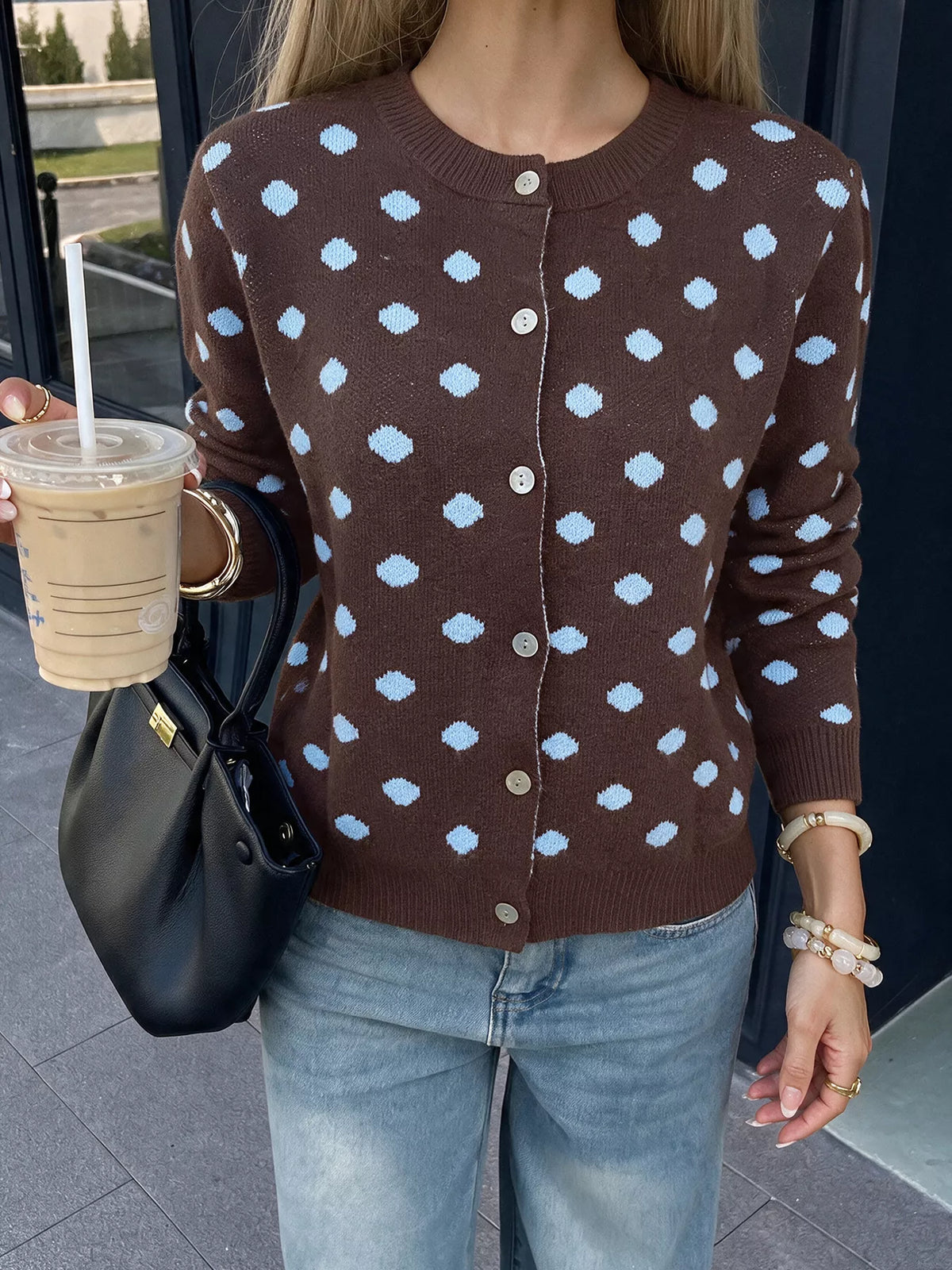 Women’s polka dot button-up cardigan by Trendsi, featuring a lightweight knit with a classic polka dot pattern and front button closure.