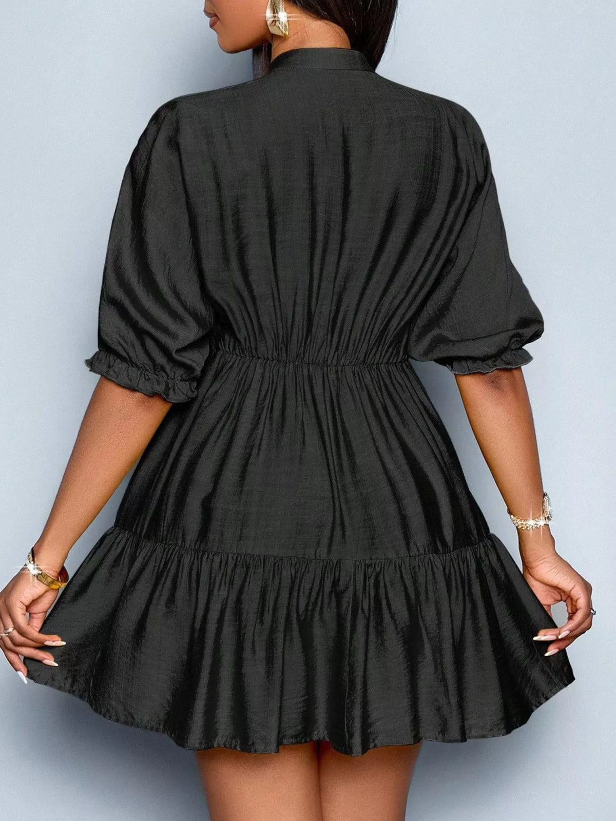 Notched half sleeve tiered dress by Plush Fashion Hub, featuring a stylish layered design and a flattering fit.