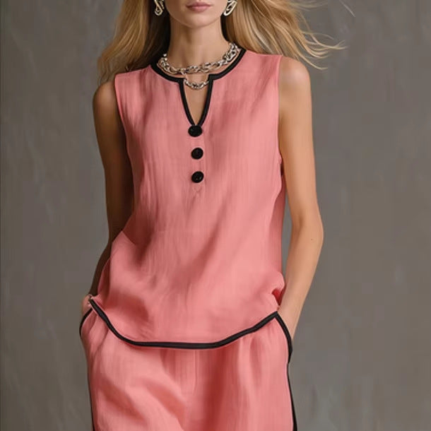 Women's minimalist sleeveless two-piece casualwear set by FitiqueFit, featuring a simple top and matching skirt or pants.