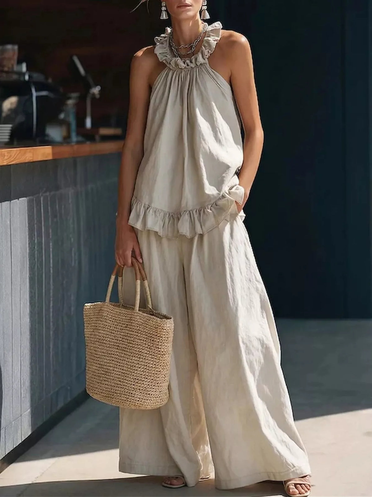 Plus size matching set with ruffled halter neck top and wide-leg pants from Plush Fashion Hub, shown in a stylish full outfit.