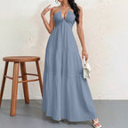 Backless halterneck V-neck pleated A-line dress for women by Plush Fashion Hub, shown with flowing fabric and elegant design.