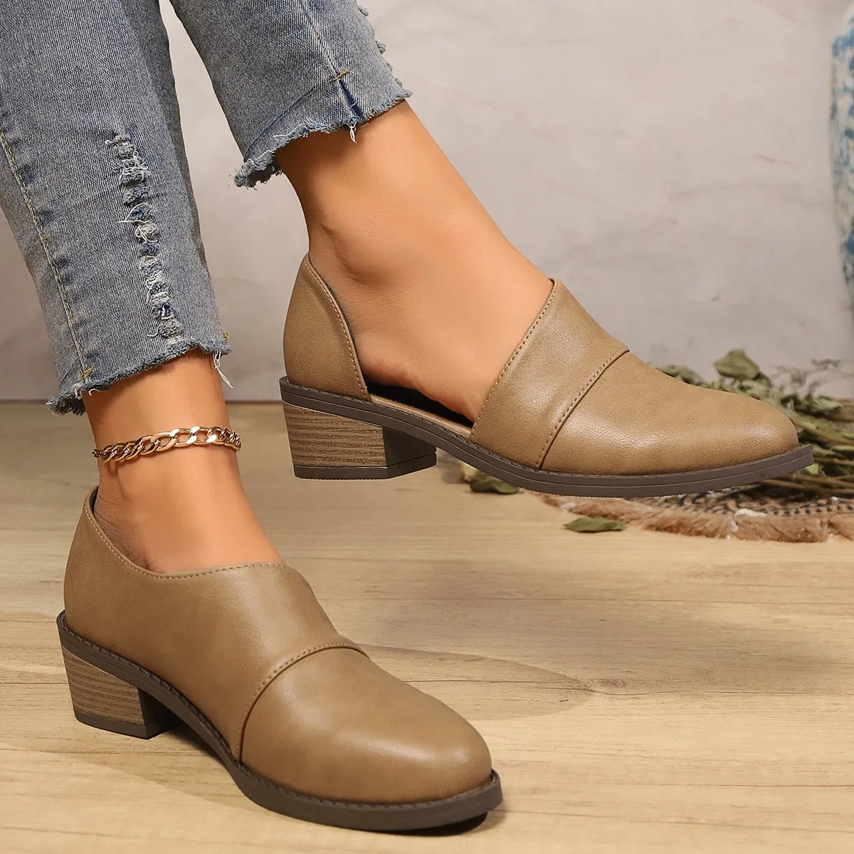 Women's Point Toe Block Heels Pumps by Trendsi, stylish black shoes with a sleek pointed toe and chunky block heel.