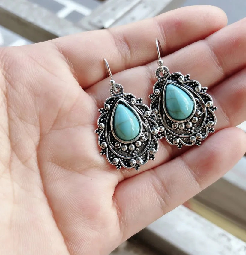 Artificial turquoise alloy teardrop dangle earrings with intricate design, perfect for stylish accessories.