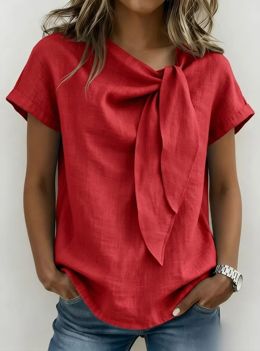 Women's loose-fit casual T-shirt by FitiqueFit, short sleeve pullover in soft fabric, shown in a relaxed fit.