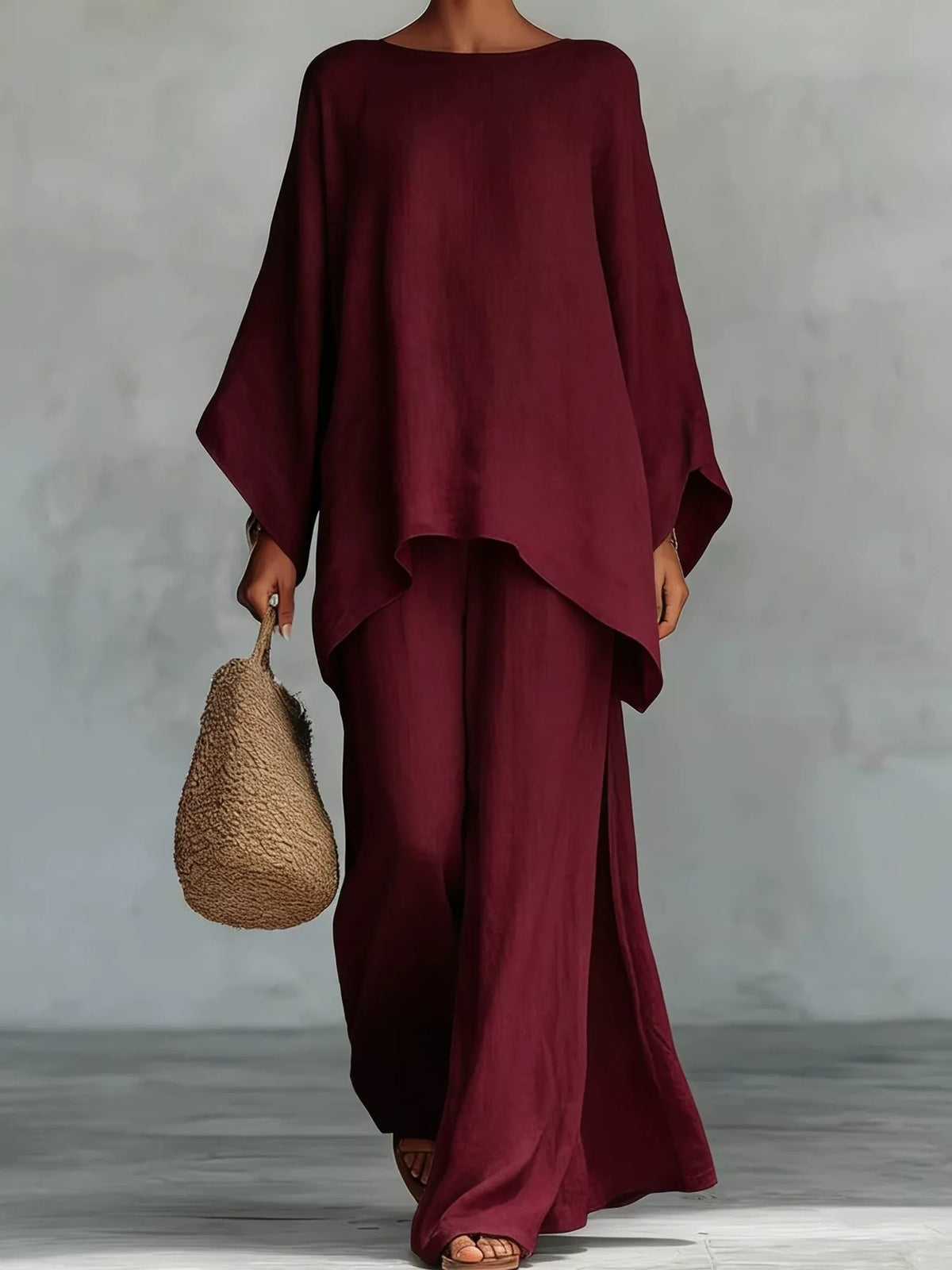 Casual plus size two-piece pants set with loose fit top and matching pants, trendy fashion by Trendsi.