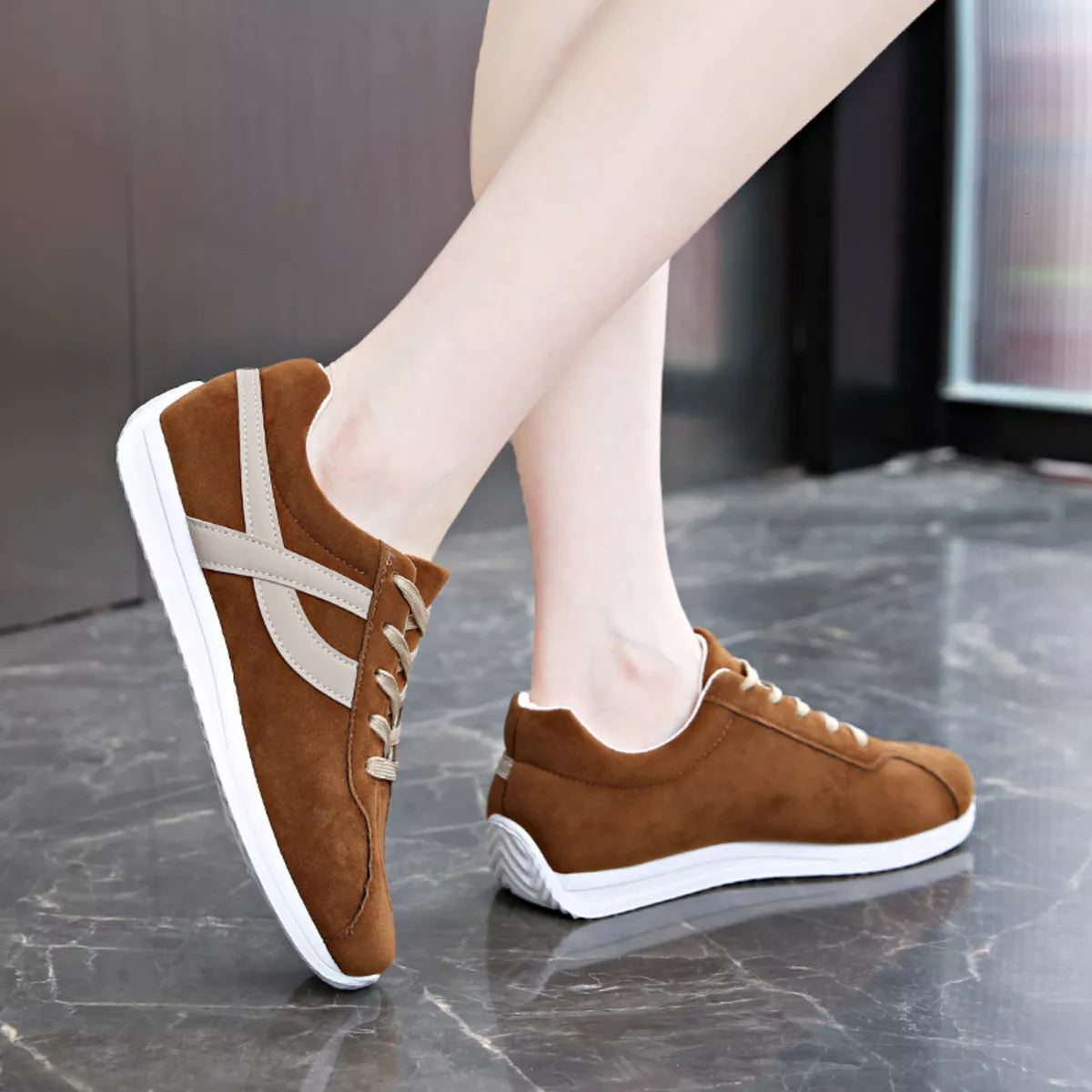 Women’s round toe lace-up sneakers from Trendsi with white soles and stylish design, perfect for casual wear.