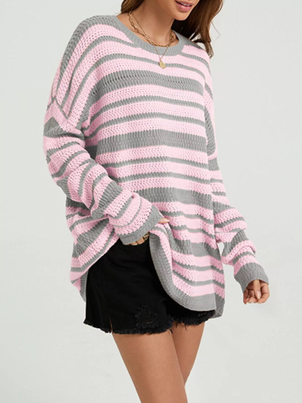 Trendsi striped drop shoulder sweater for women, featuring a relaxed fit with horizontal stripes and soft knit fabric.