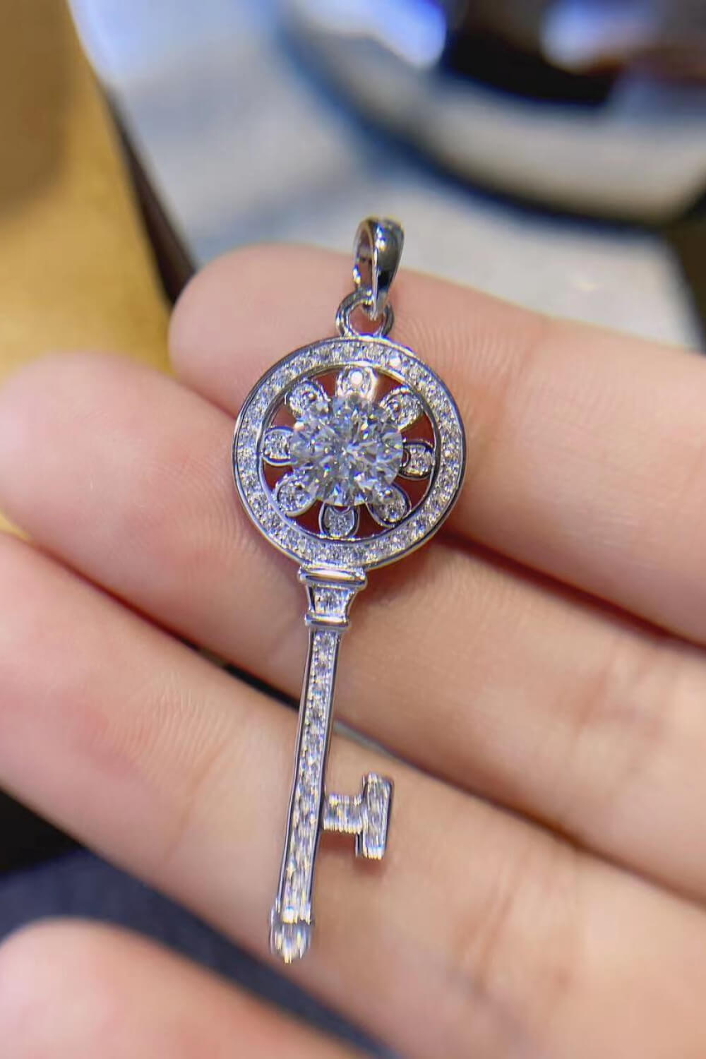 Platinum plated key pendant necklace with 1 carat moissanite gemstone, jewelry by Plush Fashion Hub, elegant and sparkling design