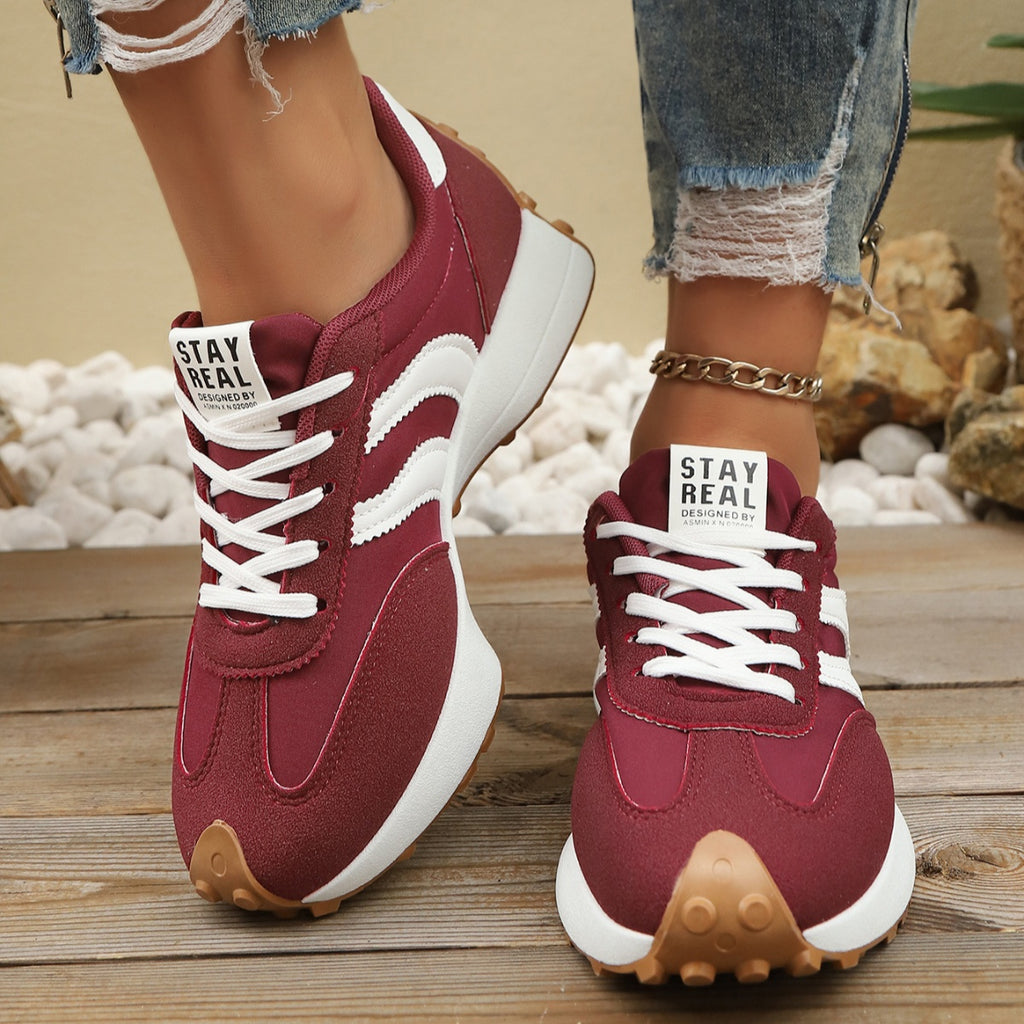 Women's round toe lace-up flat casual sneakers from Trendsi, made of comfortable PU leather with a stylish design.