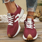 Women's round toe lace-up flat casual sneakers from Trendsi, made of comfortable PU leather with a stylish design.