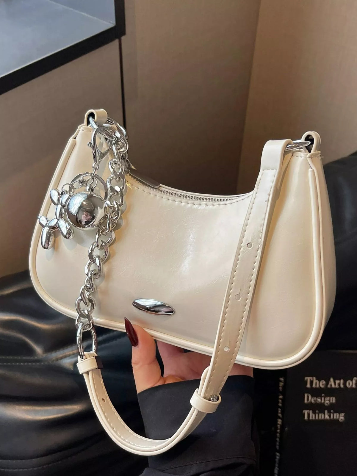 Trendsi PU leather shoulder handbag with sleek design, featuring a spacious interior and adjustable strap, perfect for everyday use.