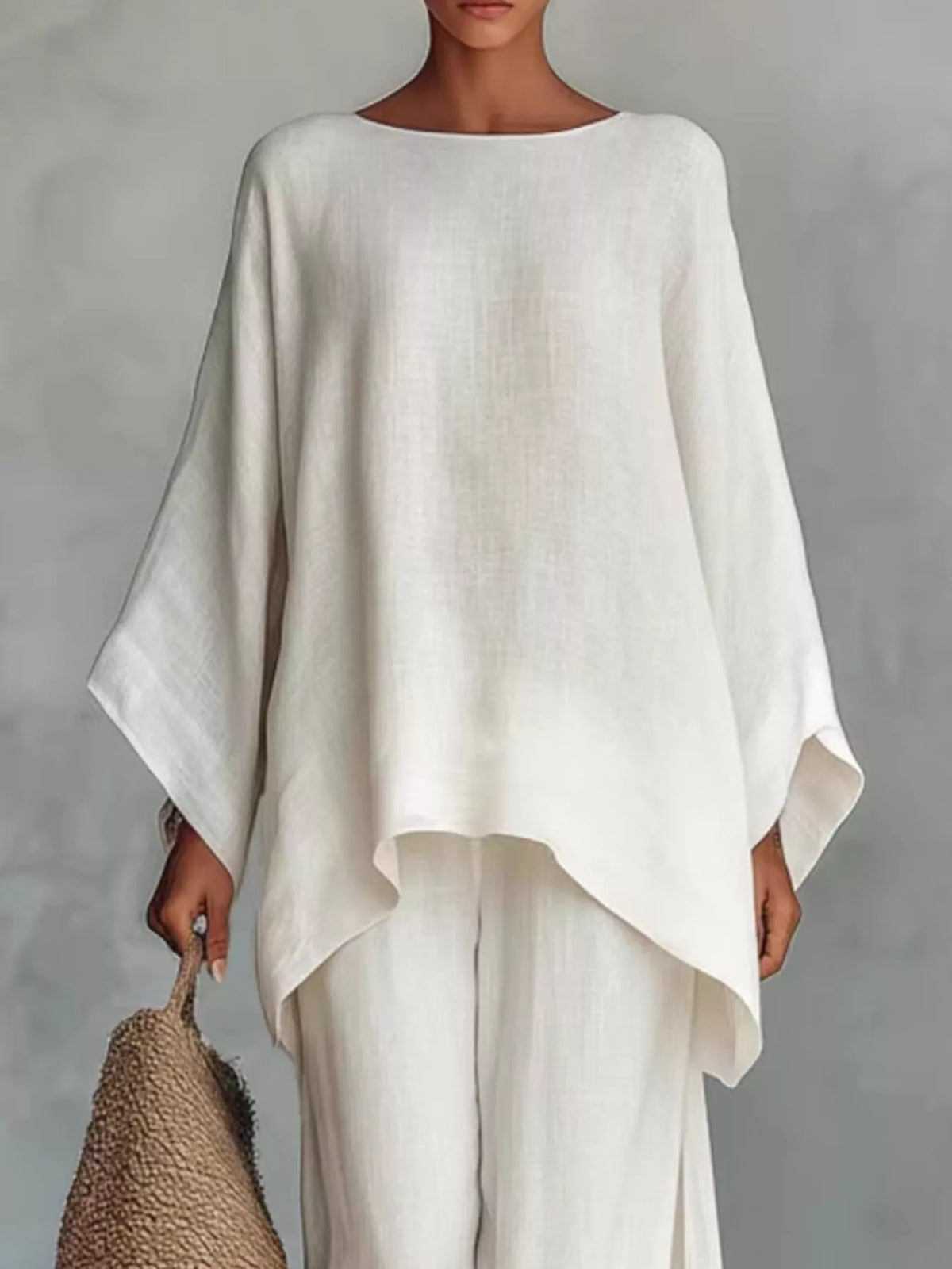 Plus size round neck top and wide-leg pants set from Plush Fashion Hub, featuring a comfortable, stylish matching pant set.
