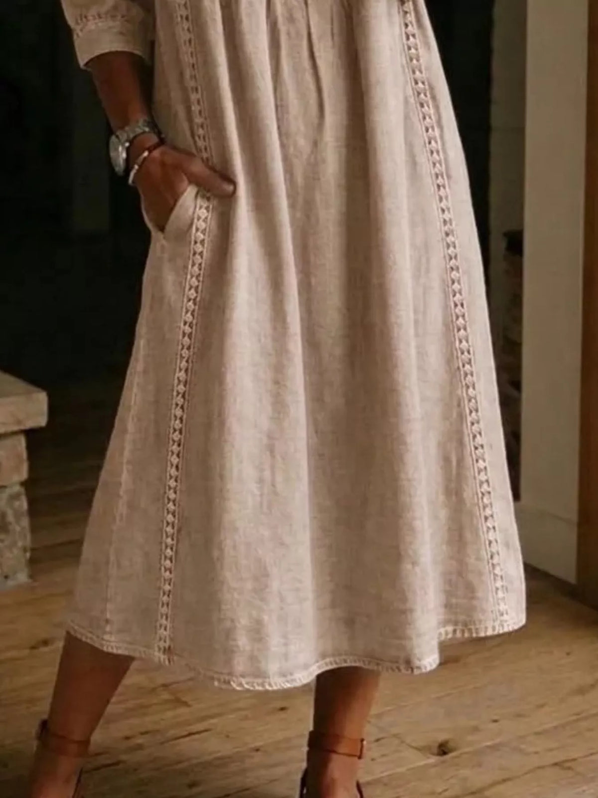 Plus size full-length V-neck midi dress with 3/4 sleeves by Trendsi, shown in a stylish and comfortable fit.