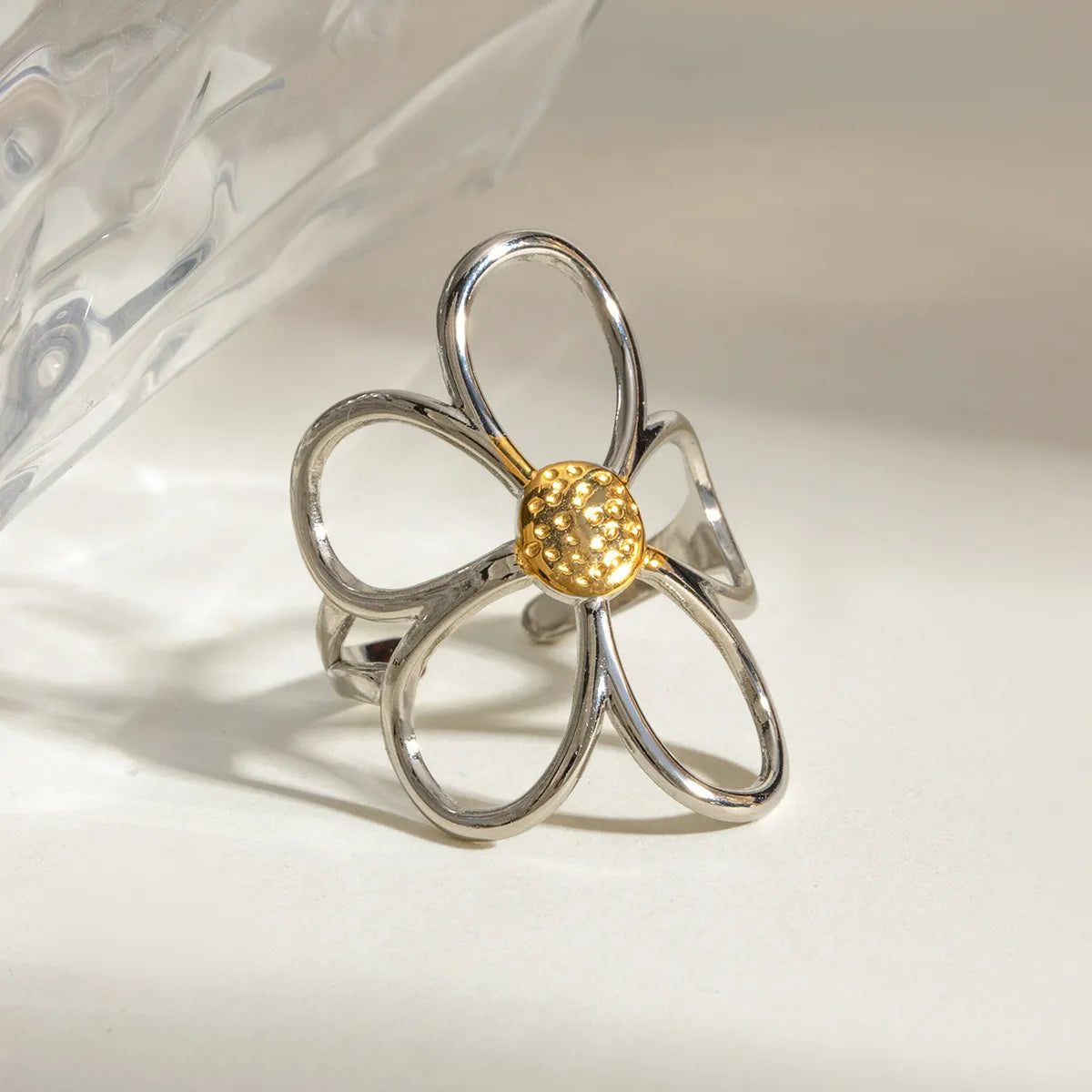 Two-tone daisy flower ring by Plush Fashion Hub featuring a gold and silver finish with detailed daisy flower design.