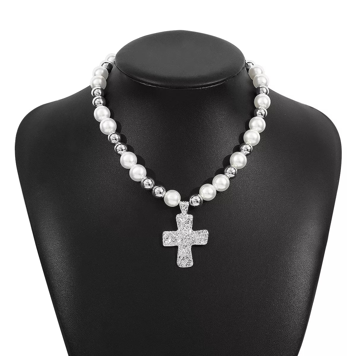 Pearl and cross pendant necklace from Plush Fashion Hub, featuring a elegant pearl and cross design on a delicate chain.
