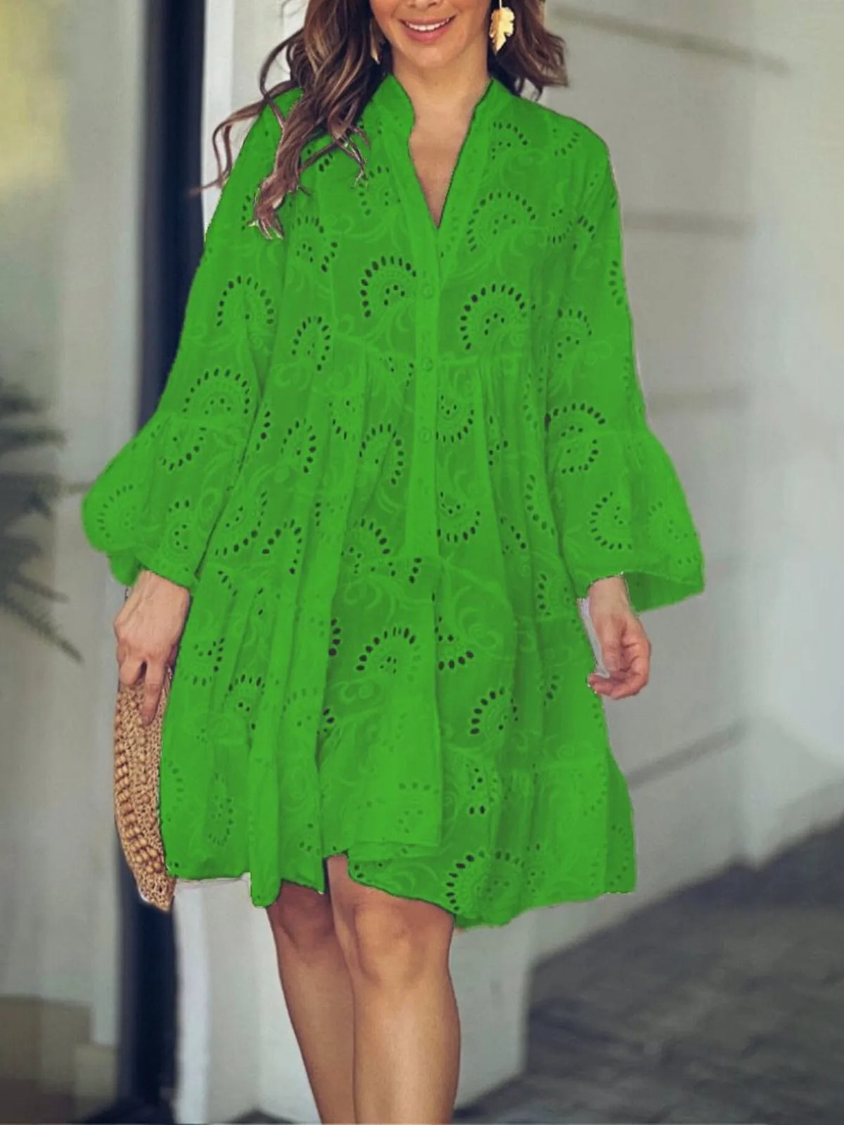 Plus size full-length eyelet ruffled hem tiered dress by Trendsi, showcasing its layered design and feminine ruffle details.