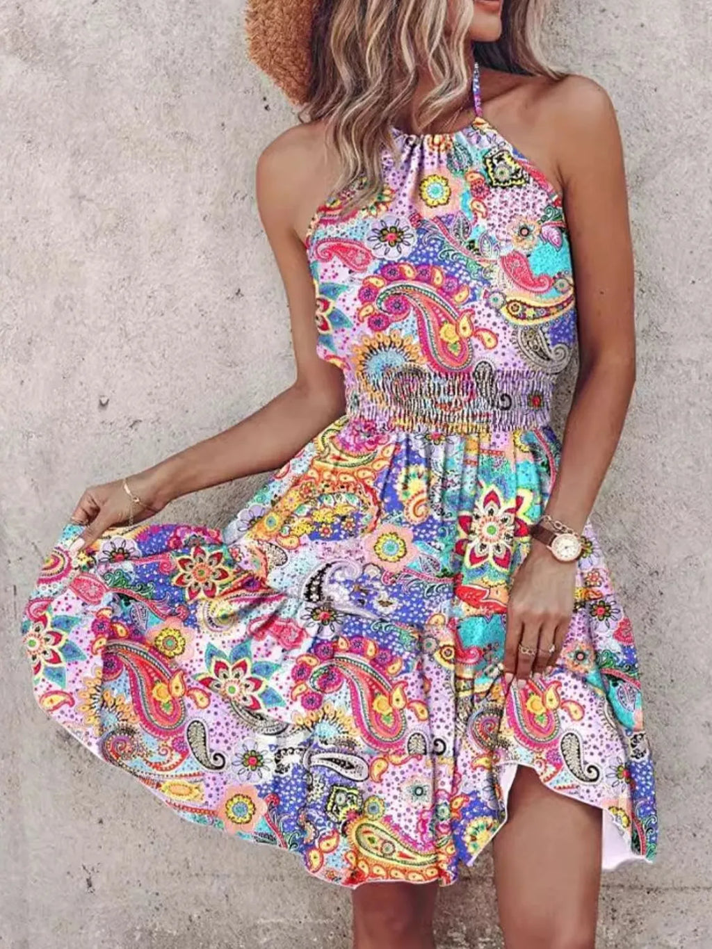 Paisley print halter neck mini dress from Plush Fashion Hub, showcasing the stylish dress with a fitted halter top and mini length.