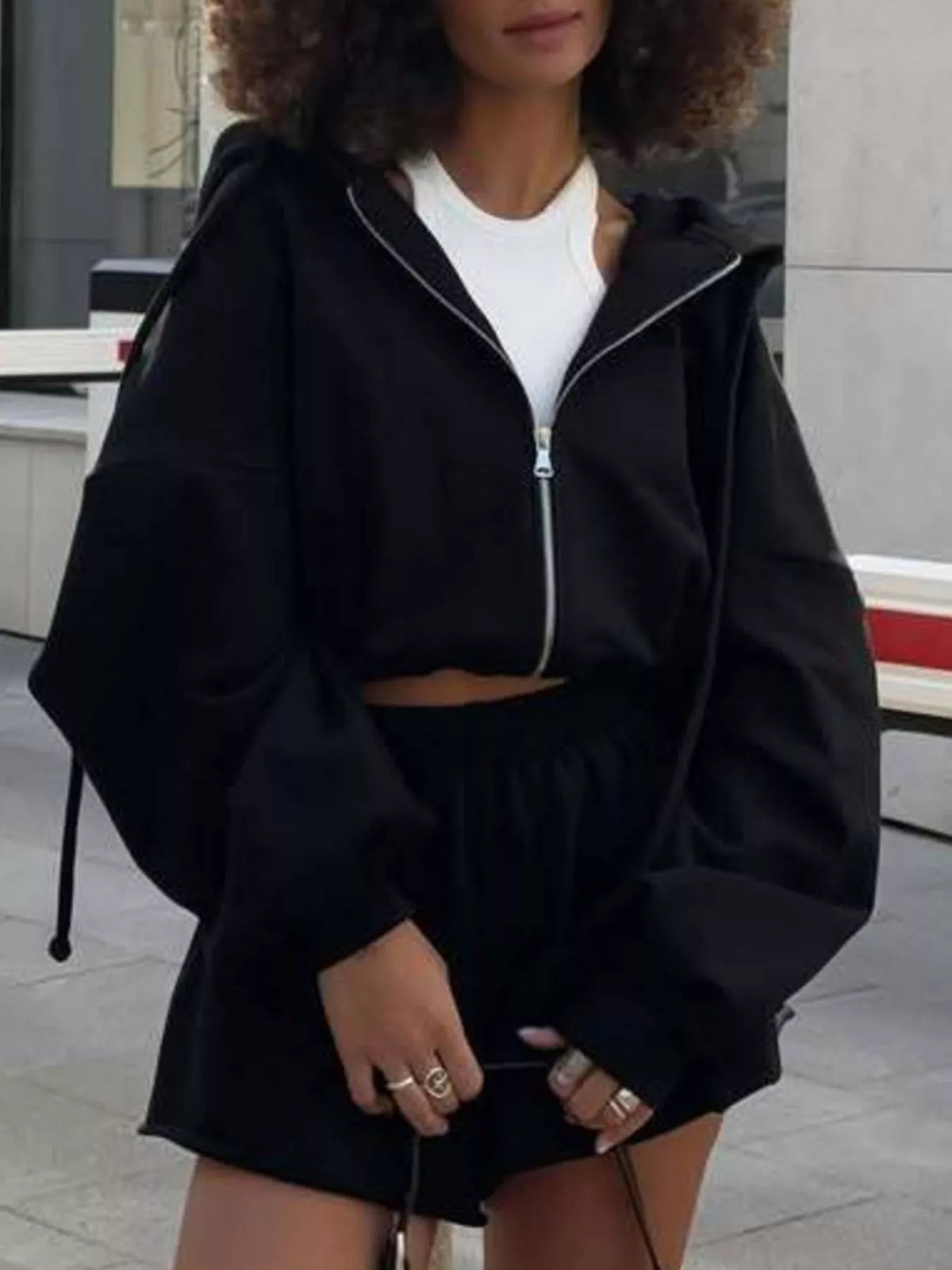 Plush Fashion Hub zip-up long sleeve outerwear and matching shorts set, casual style, lightweight fabric, worn together in a relaxed fit.