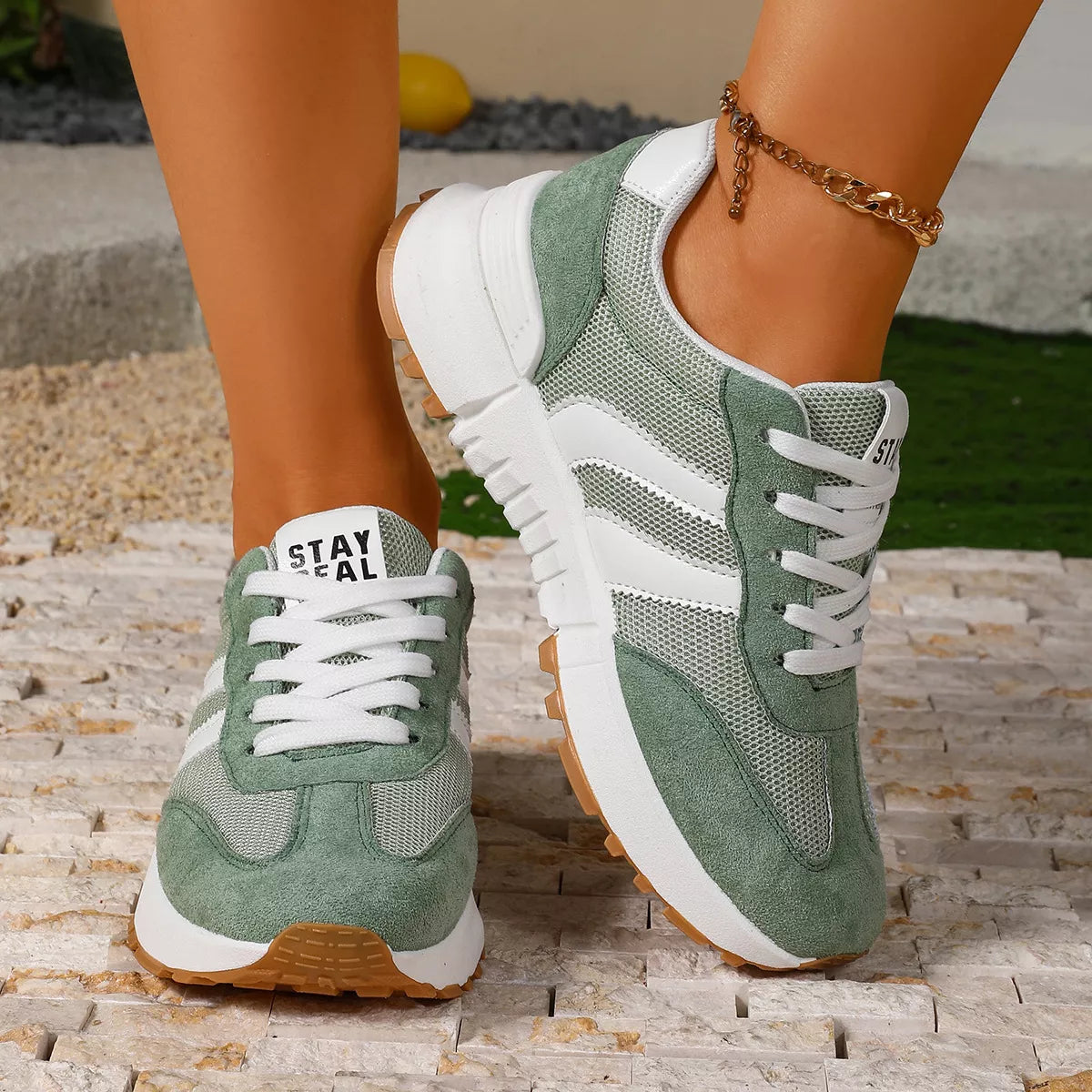 Women's round toe lace-up sneakers by Trendsi featuring a classic design and white rubber sole.
