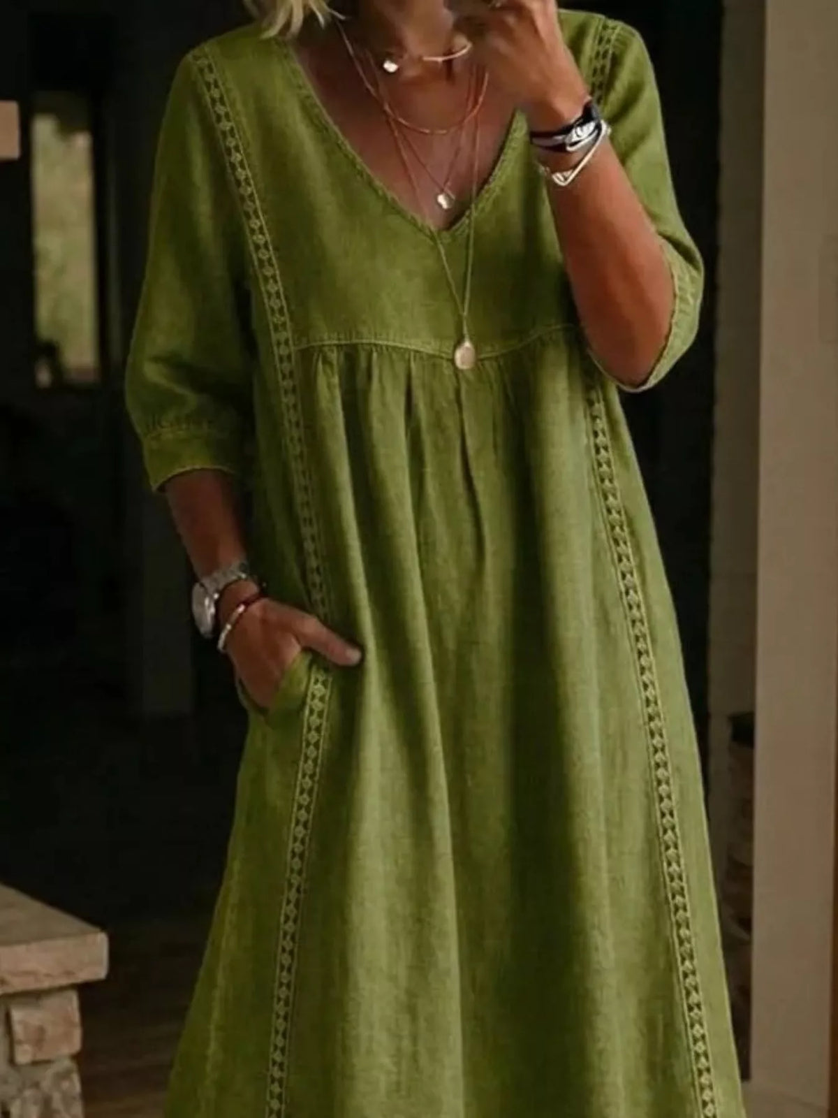 Plus size full-length midi dress with a V-neck and 3/4 sleeves, featuring a stylish, flowy design from Trendsi.